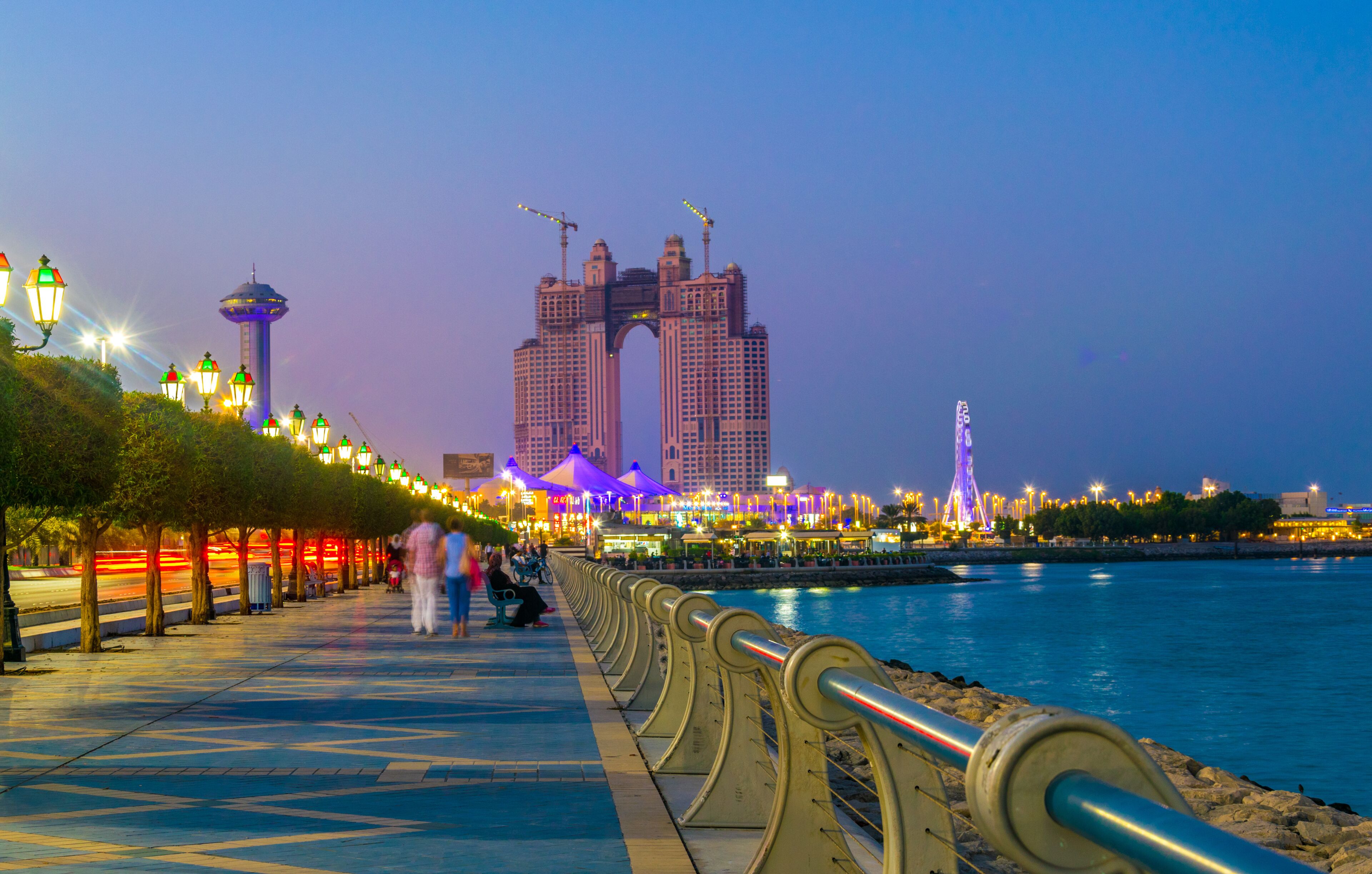 View of the corniche - promenade in Abu Dhabi during sunset, UAE
