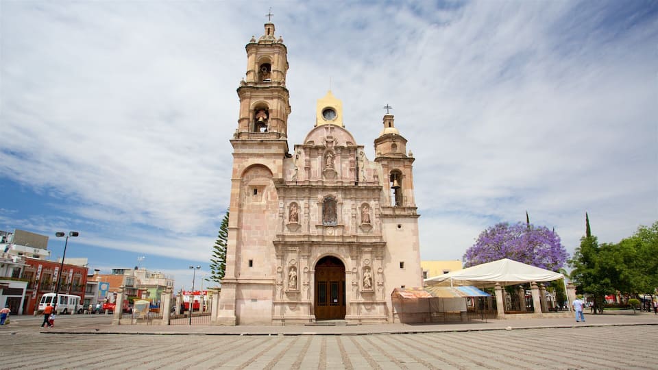 San Marcos Church which includes a square or plaza, heritage architecture and a church or cathedral