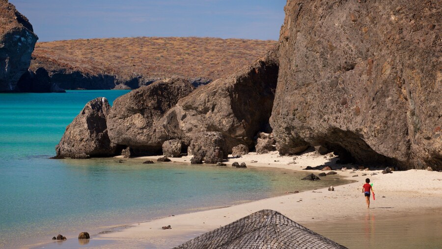 Balandra Beach featuring rugged coastline, a beach and general coastal views