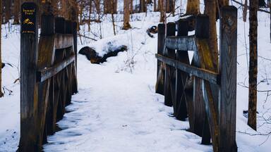 Chesterland, Ohio, USA - 2-21-22: A small bridge in the Bessie Benner Metzenbaum Park