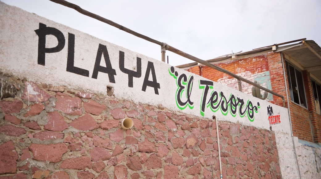 Tesoro Beach featuring signage