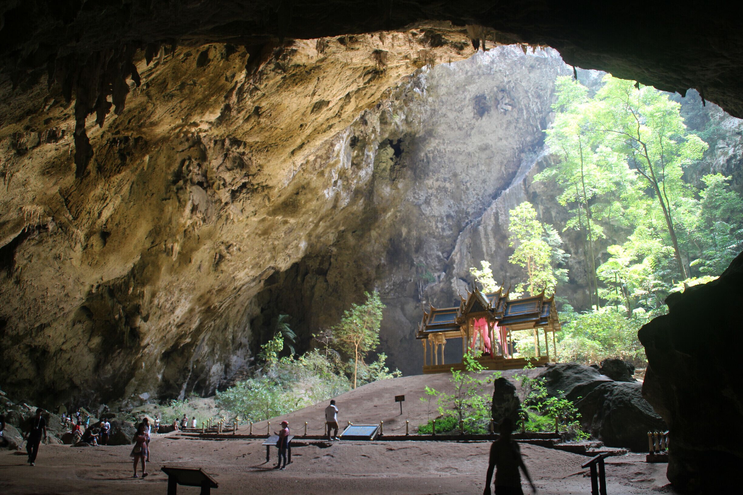 Phraya Nakhon cave is a large cave which has a big hole in the ceiling so light from the sun can come through into the cave. It is part of the Khao Sam Roi Yot National Park. One is in touch with nature when going to this place.