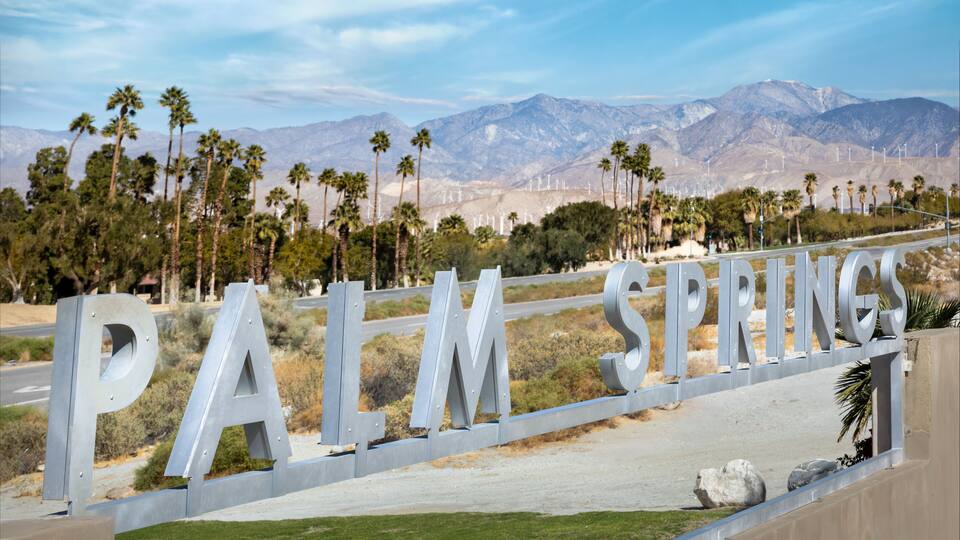 Palm Springs California Sign along North Palm Canyon Drive welcomes visitors to this historic city