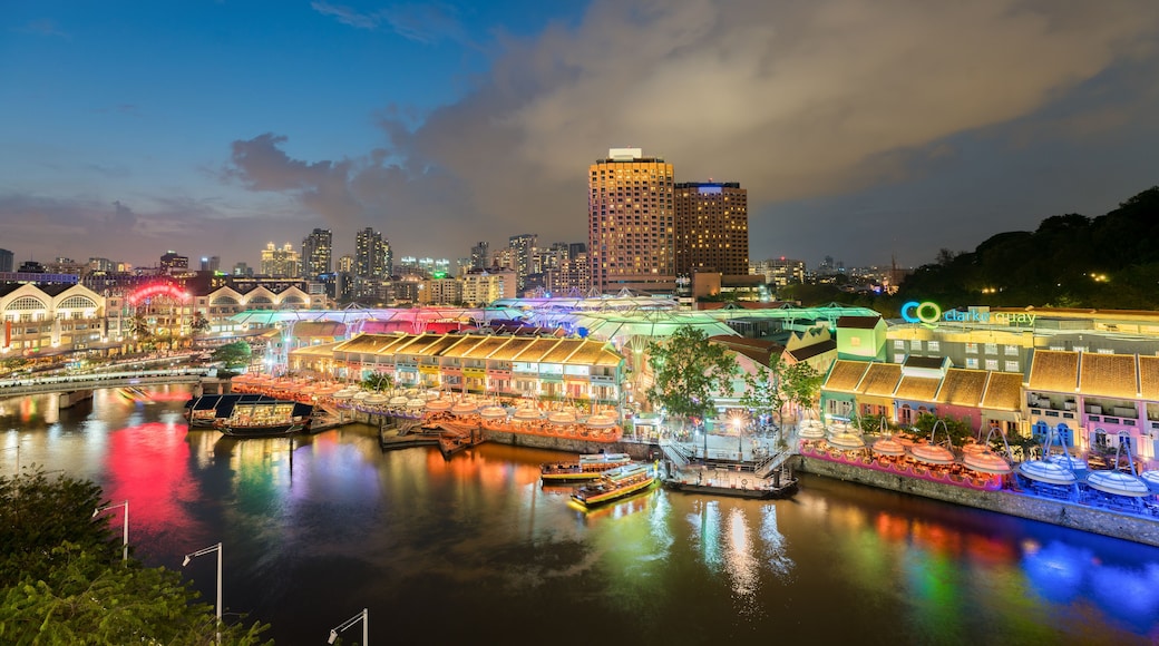Colorful light building at night in Clarke Quay, Singapore. Clarke Quay, is a historical riverside quay in Singapore.