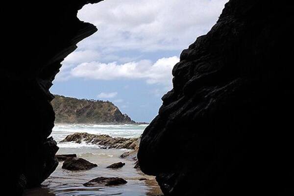 Inside a cave on one of Australia's 'best secrets' - my home beach. However, as often happens, word is out and itâs not such a secret anymore, although itâs still relatively unknown and very beautiful.
In the 1850s, a great number of Aboriginal people were murdered in Ballina, NSW. Some managed to flee north to this beach and its surrounds where they hid in caves, were found and saw the last light of day. I hadnât heard of this heinous story when I visited the place just the other day, nor had my friend who was with me.
It was high tide and spying the cave in the corner, I scaled some rocks, carrying my iPhone, while my friend swam towards it with his GoPro. Itâs a small, beautiful place and we didnât feel any darkness apart from the waning light. Inside the rocks glistened with seawater in the sheltered gloom, while next door a smaller cave frothed and spat across the handsome coastline.
If you do manage to find this place, enter when the tide is low.
#localgem