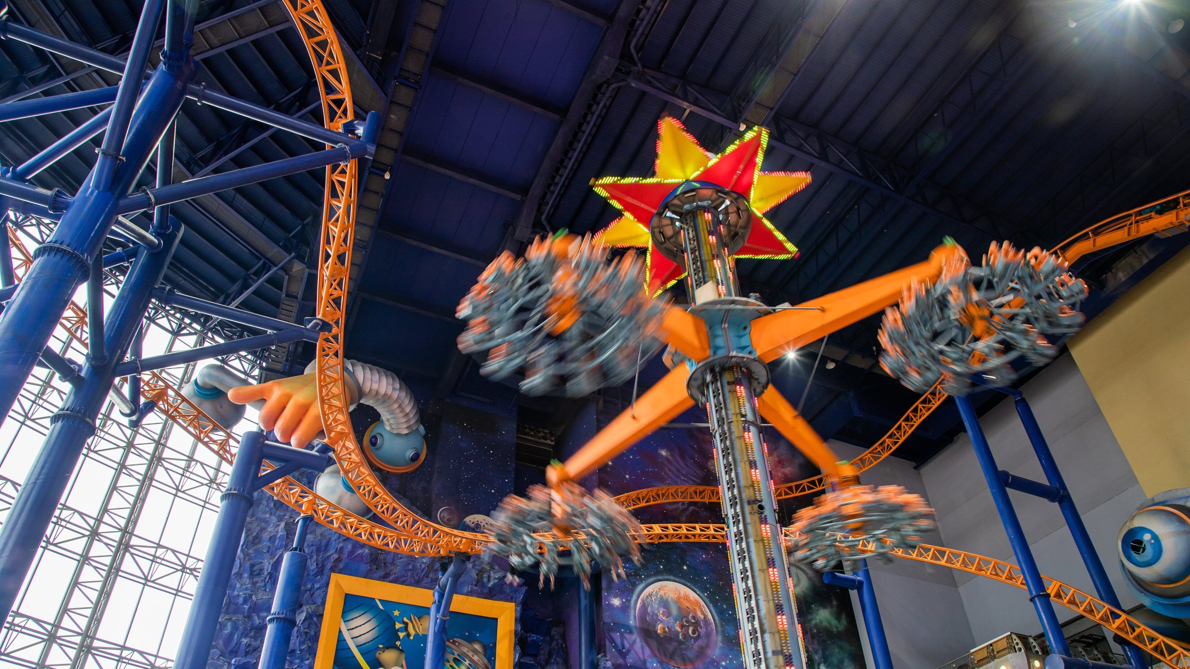 Bukit Bintang Plaza featuring rides and interior views