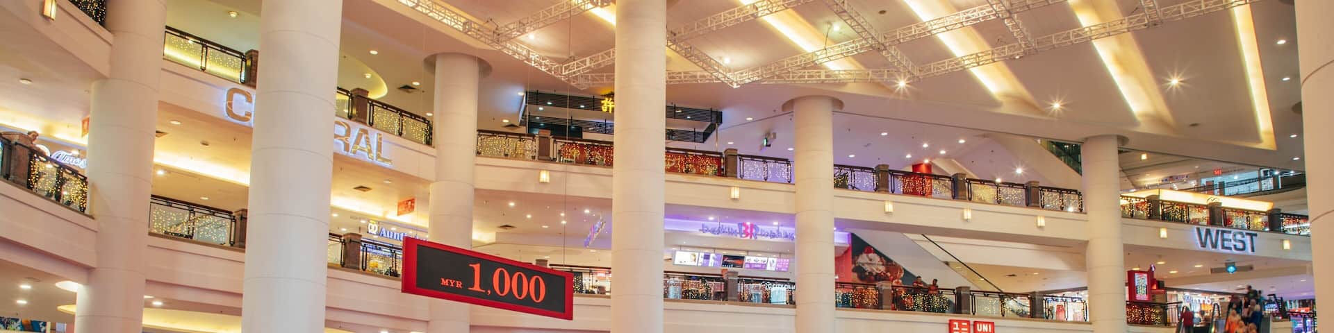 Bukit Bintang Plaza showing interior views and shopping as well as a large group of people