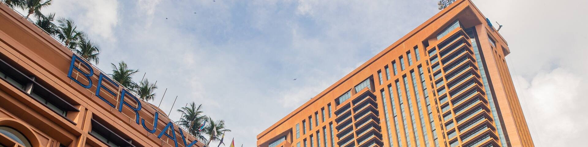 Bukit Bintang Plaza showing a skyscraper and signage