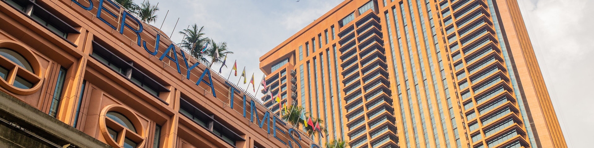 Bukit Bintang Plaza showing a skyscraper and signage