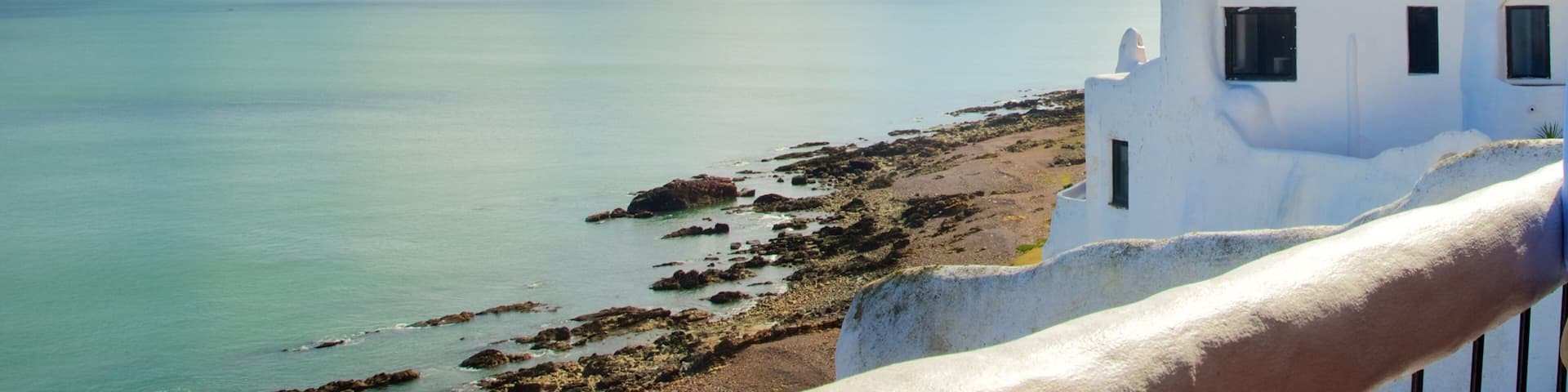 Punta Ballena featuring landscape views, general coastal views and heritage architecture