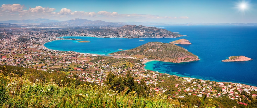 Aerial view of Porto Rafti town. Colorful spring seascape of Aegean sea. Sunny morning panorama of the Greece, Europe. Beauty of nature concept background.
