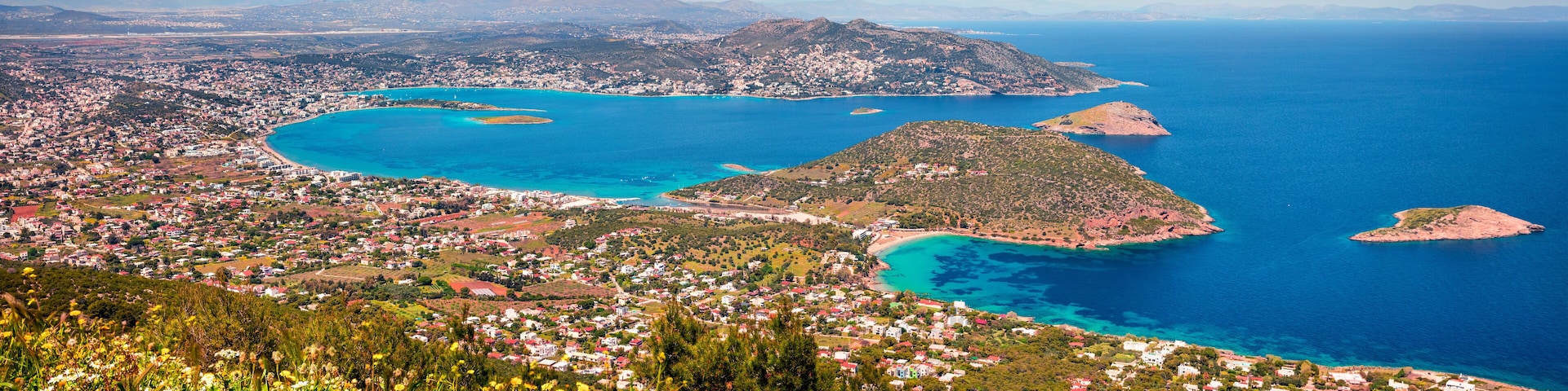 Aerial view of Porto Rafti town. Colorful spring seascape of Aegean sea. Sunny morning panorama of the Greece, Europe. Beauty of nature concept background.