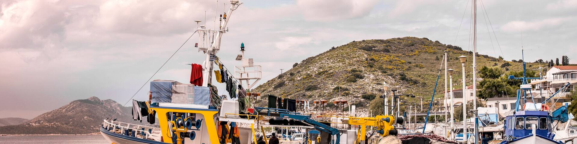 Fishing boats at small harbour in Pachi village. Megara,Greece