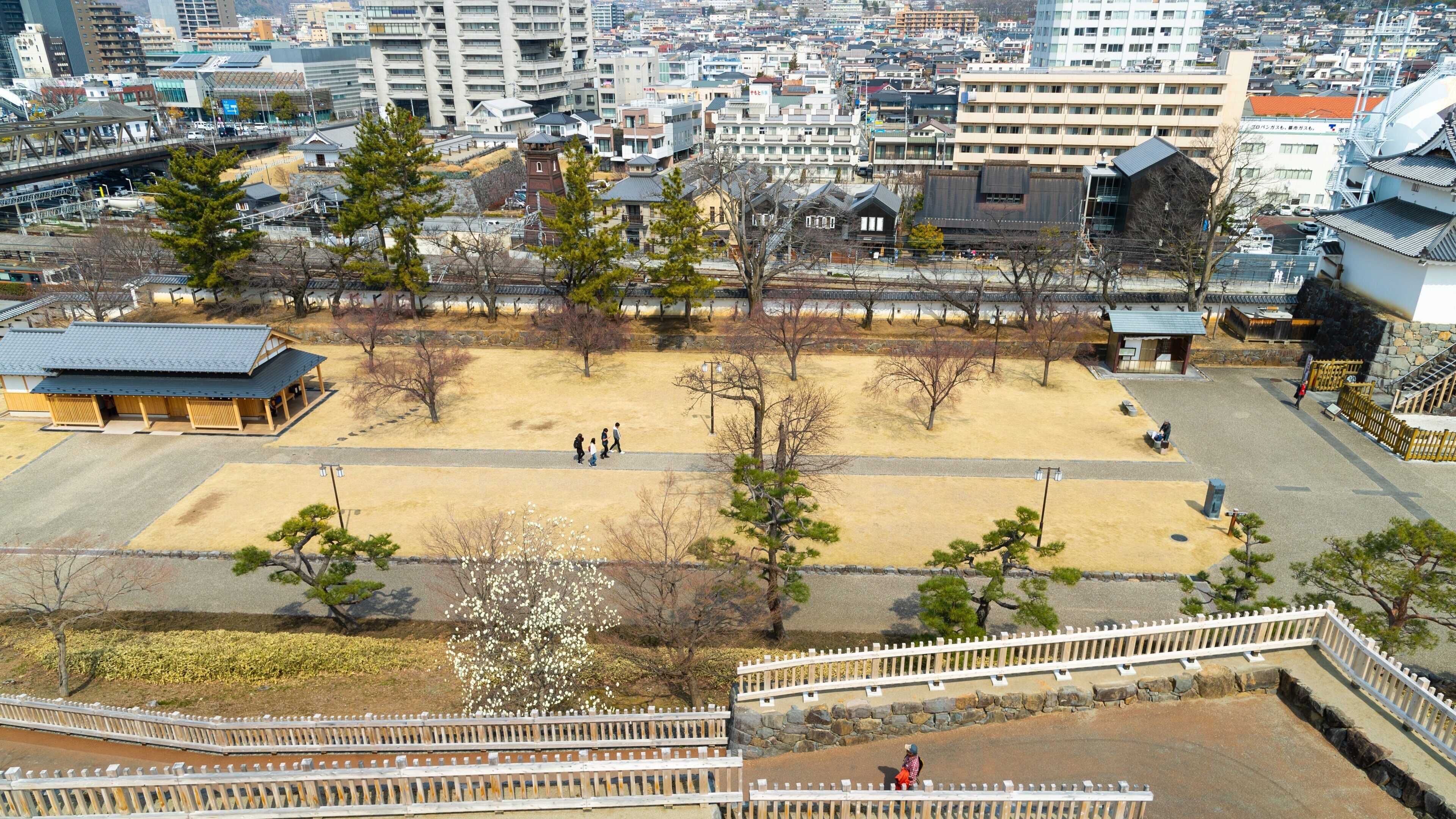 Maizuru Castle showing landscape views and a city