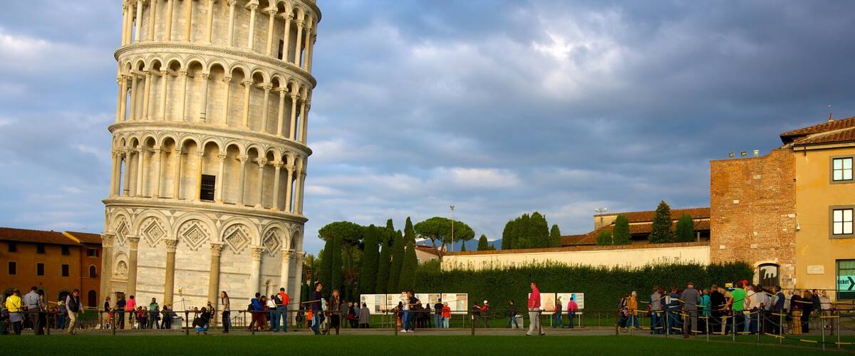 The Leaning Tower of Pisa with tourists in the foreground.