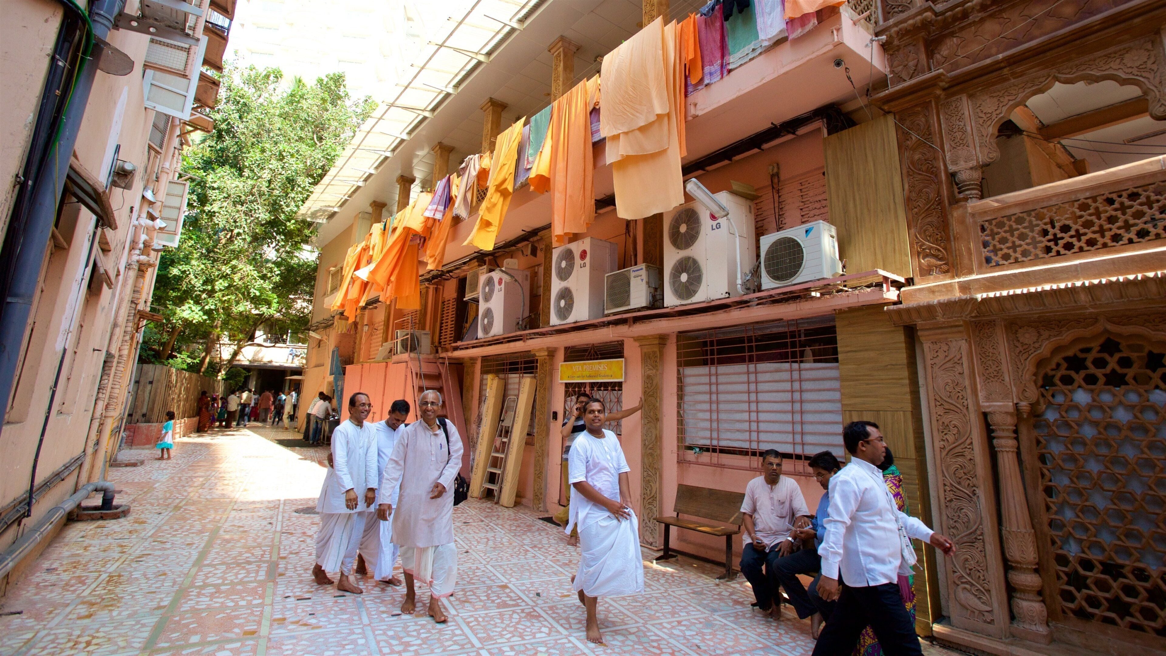 ISKCON Temple which includes street scenes as well as a small group of people