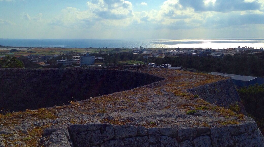 These castle ruins give a great vantage point over looking Yomitan. There is a small park of paths and pine trees around the base and beautiful grass to sit and relax inside.