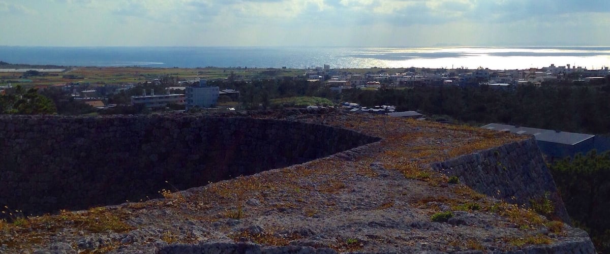 These castle ruins give a great vantage point over looking Yomitan. There is a small park of paths and pine trees around the base and beautiful grass to sit and relax inside.