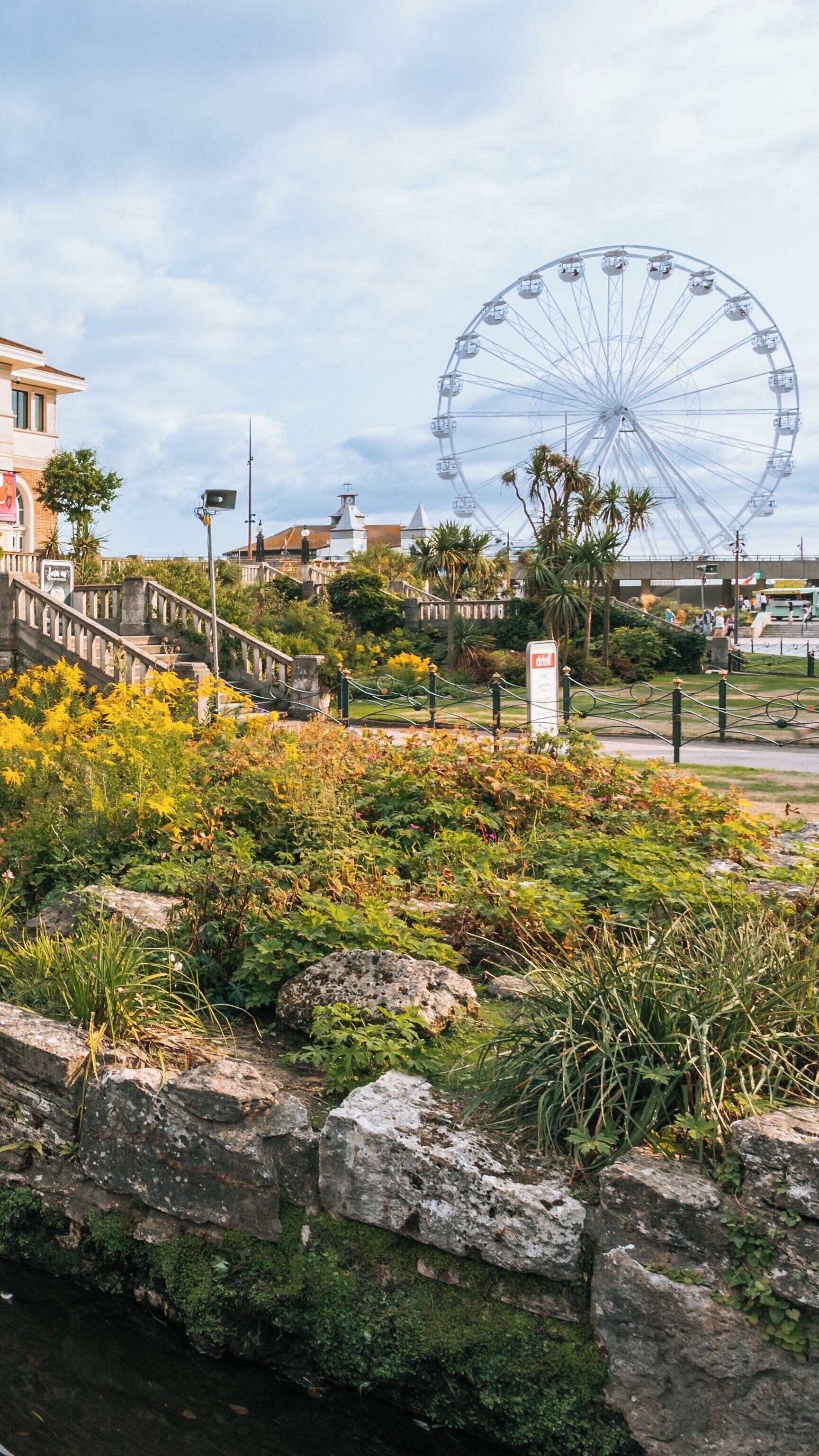 Bournemouth Pavilion Theatre and Ferris Wheel in Bournemouth City Centre showcases vibrant gardens and cultural landmarks