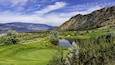 A golf course in the Okanagan Valley near Osoyoos British Columbia Canada with Osoyoos Lake in the background