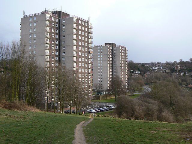 Woodthorpe and Winchester Courts. Tower blocks on the site of Sherwood Station. They have been redeveloped as old persons' flats. There seem to be a few more cars than when Mick Garret was there 87835