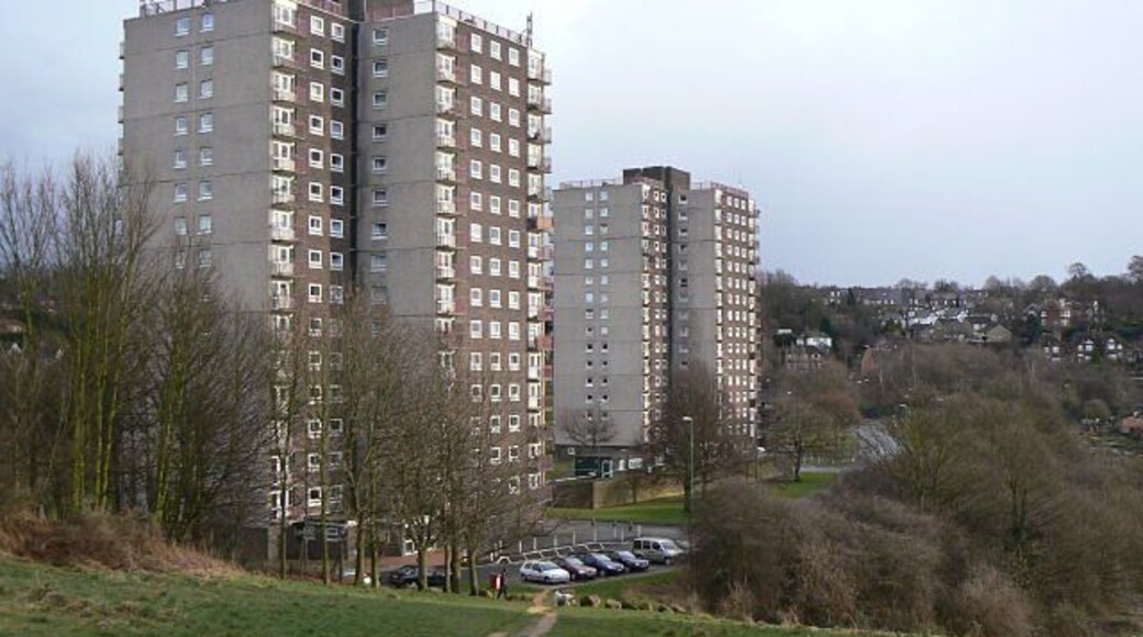 Woodthorpe and Winchester Courts. Tower blocks on the site of Sherwood Station. They have been redeveloped as old persons' flats. There seem to be a few more cars than when Mick Garret was there 87835