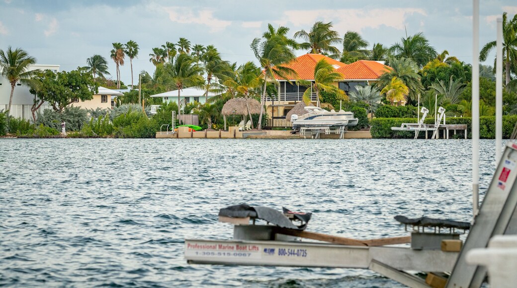 Sugarloaf Shores which includes a bay or harbor and a house