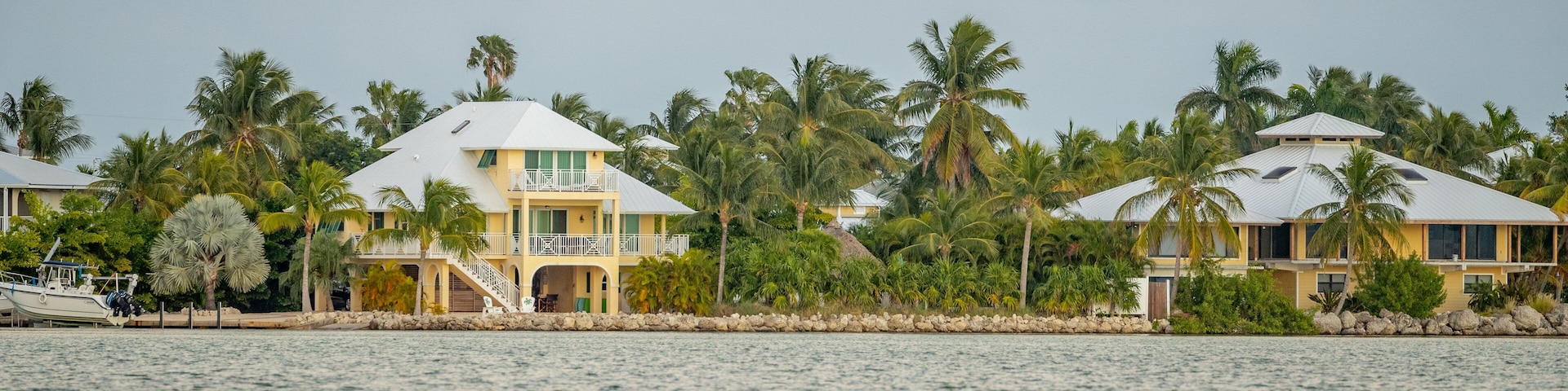 Sugarloaf Shores which includes a bay or harbor and a house