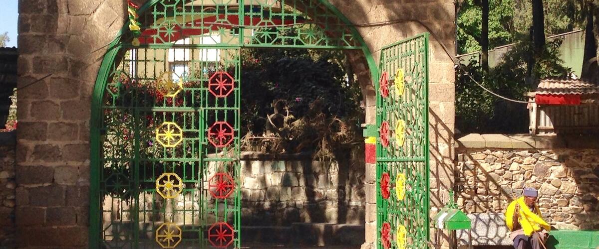 Holy Trinity Church is a well known sight in Addis Ababa and arguably one the most important churches in Ethiopia. 
You can entered the church and pictures are allowed but you'll need to leave your shoes at the door. The middle door is considered the men's entrance and the one to the far right the woman's. 
Don't forget to take a walk behind the church to see the site of the old round church and this colorful gate.