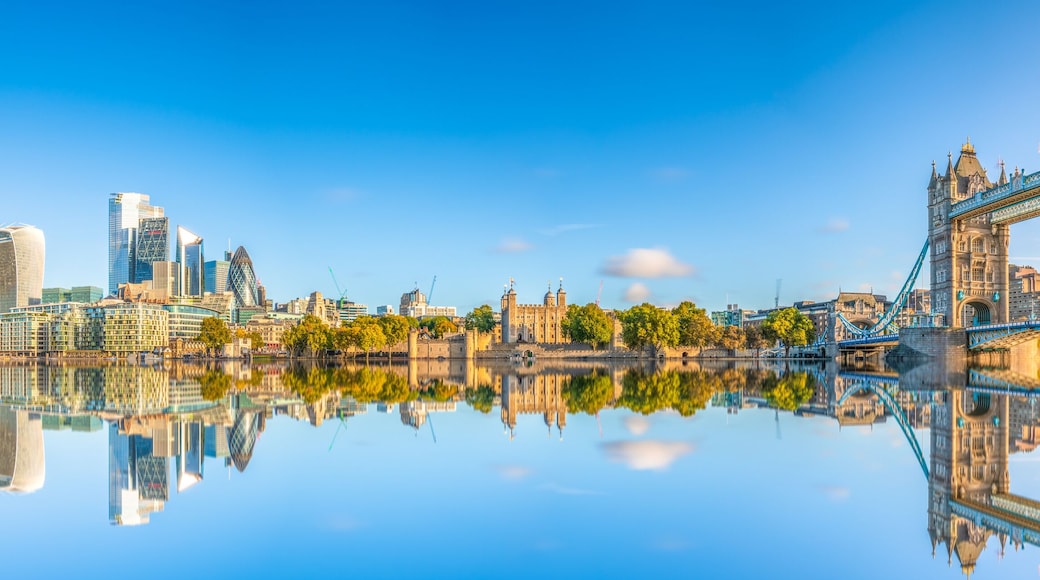 Beautiful autumn panorama of Tower Bridge and financial district of London. England. UK