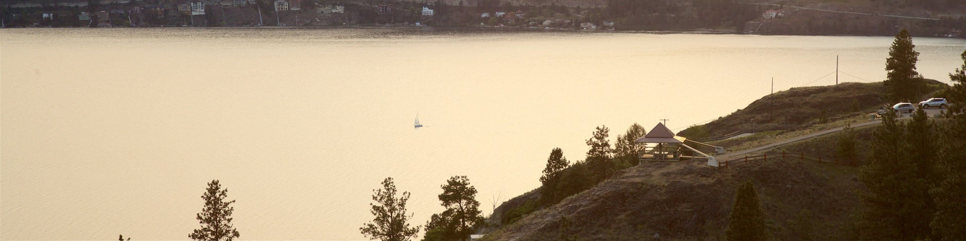 Knox Mountain Park featuring a sunset, tranquil scenes and a lake or waterhole