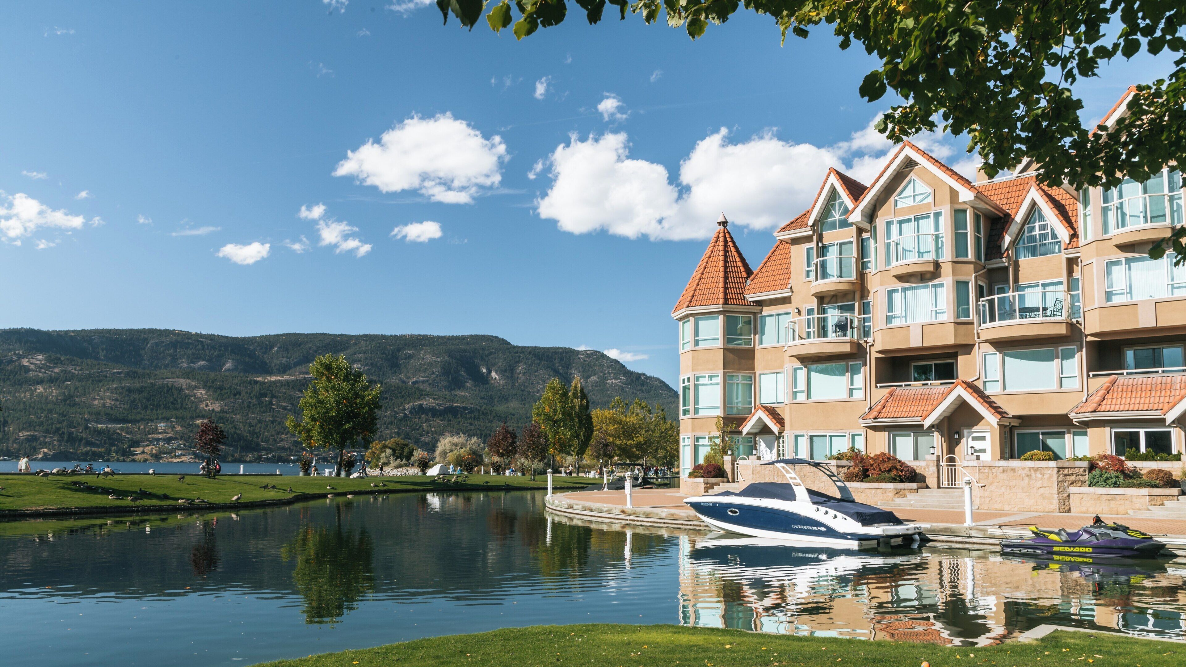 Beautiful waterfront park in Kelowna Central Business District showcasing stunning natural scenery and recreational activities throughout the year