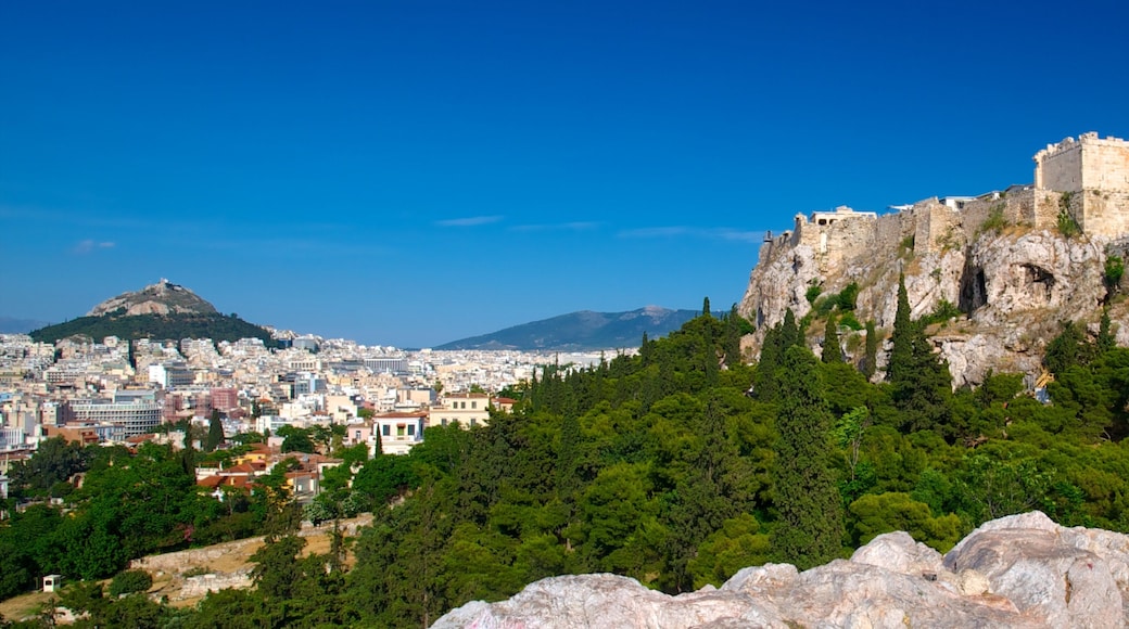 Areopagus Hill showing forest scenes, a city and mountains