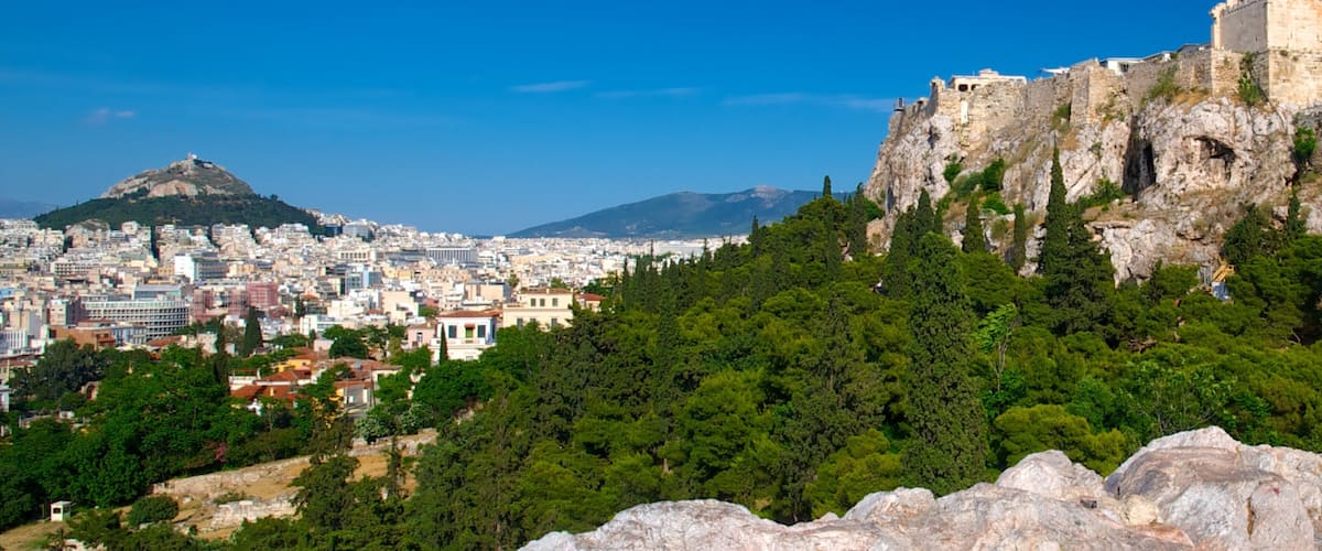 Areopagus Hill showing forest scenes, a city and mountains