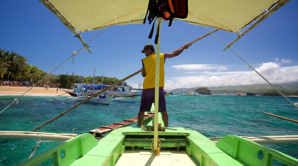 Crystal Cove Island which includes general coastal views, tropical scenes and kayaking or canoeing