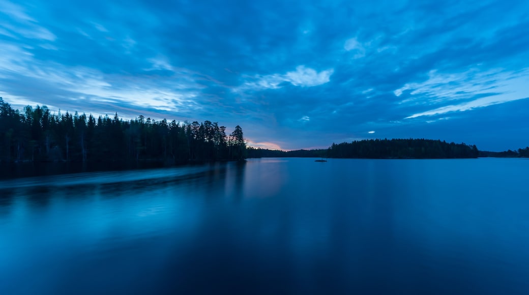 Early summer night by a lake in the forests of Finland