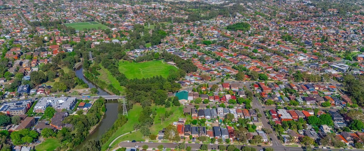 Panorama aerial drone view of western Sydney Suburbs of Canterbury Burwood Ashfield Marrickville Campsie with Houses roads and parks in Sydney New South Wales NSW Australia