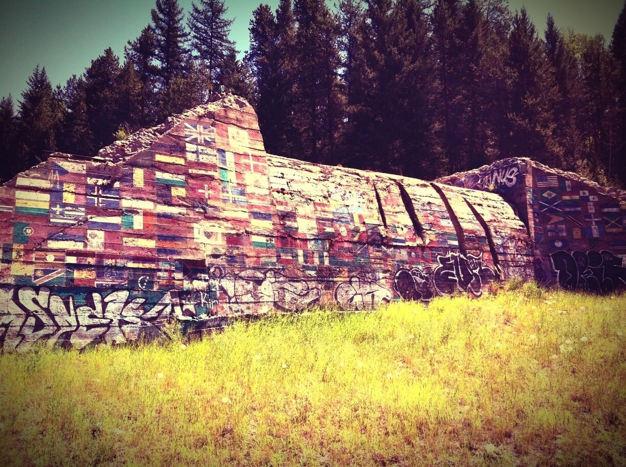 An old tunnel on the side of the road.