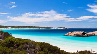 Summer coastal beach with white sands and turquoise waters
