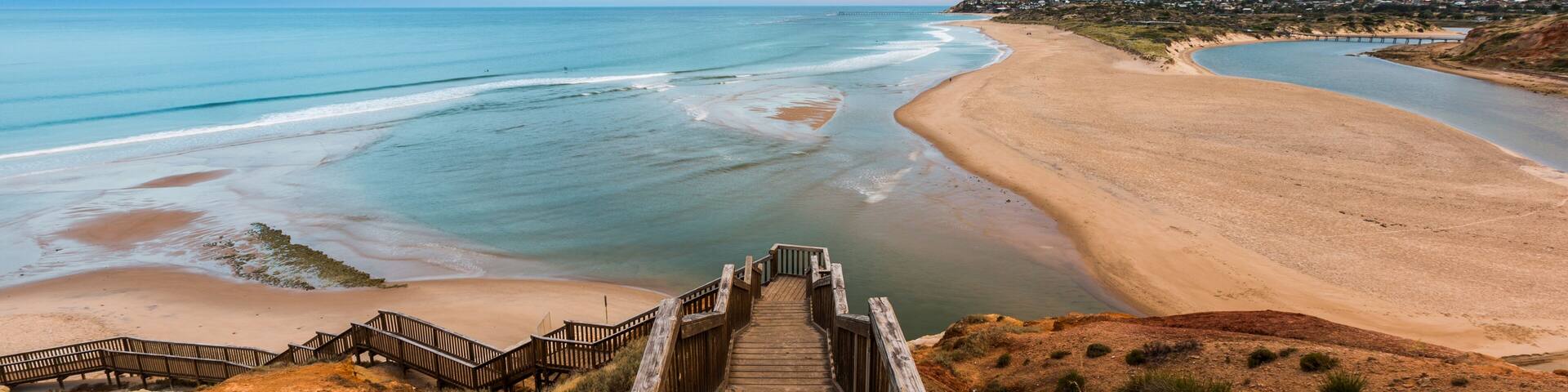 The wooden staircase leading down to the mouth of the Onkapringa river Port Noarlunga