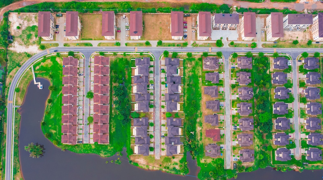 Aerial view of Lakowe Golf Estate with modern homes and a scenic lake surrounded by greenery, Lakowe, Nigeria.