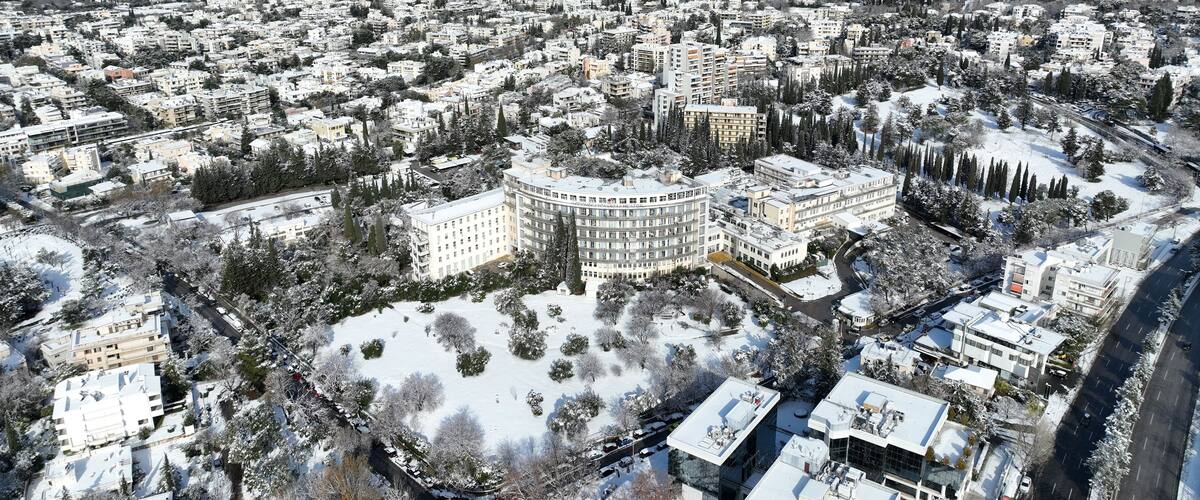 Aerial drone photo of famous injury public hospital of Athens known as KAT in Marousi covered up in snow, Attica, Greece