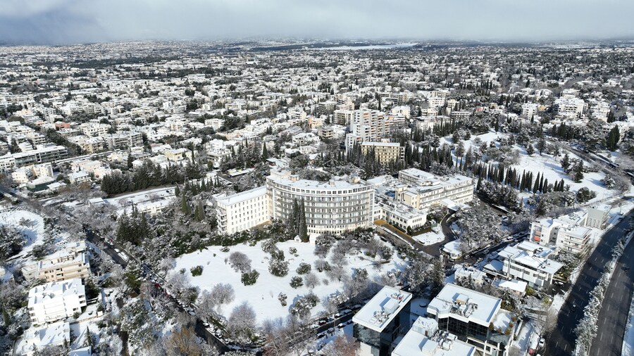 Aerial drone photo of famous injury public hospital of Athens known as KAT in Marousi covered up in snow, Attica, Greece