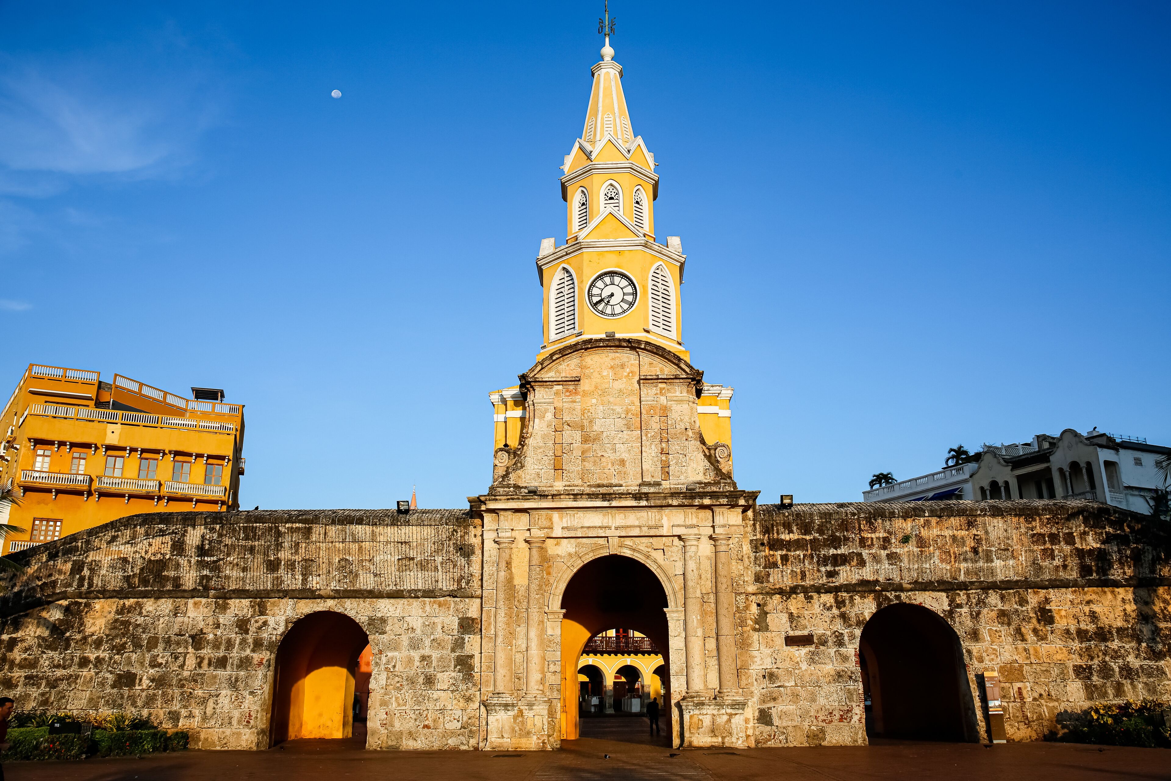 View to Torre de Reloj (Clock Tower) with blue sky and warm light, Cartagena, Colombia, Unesco World Heritage