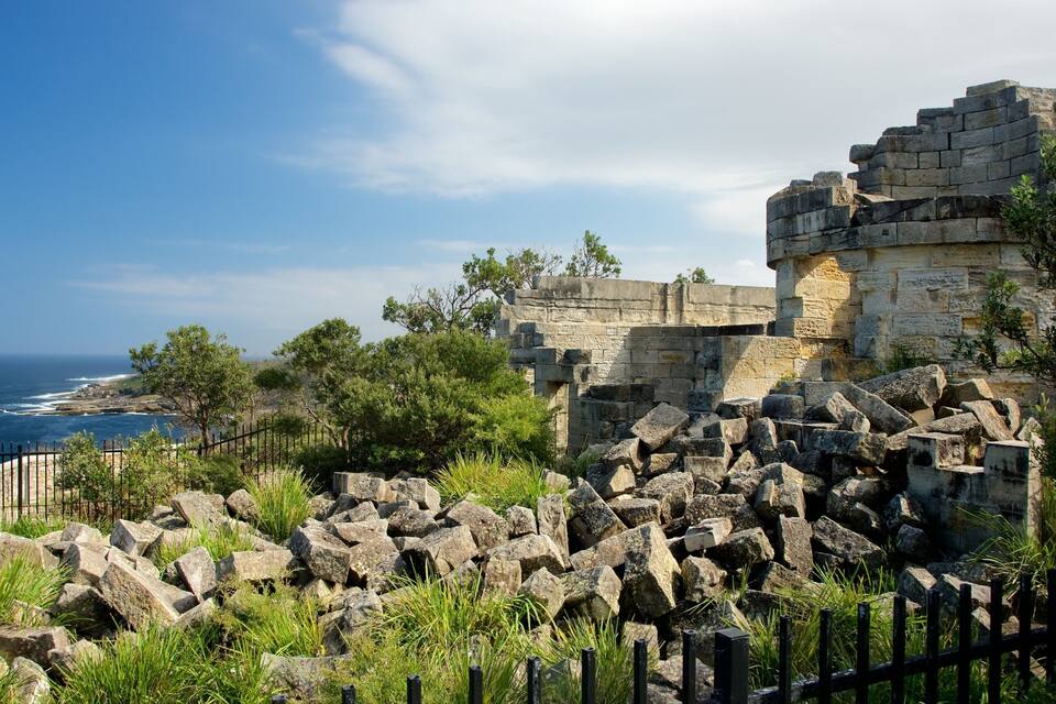 Ancient ruins with a coastal view.