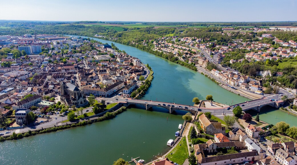 Aerial view of the confluence between the Seine and the Yonne showing different colors of water mixing in the town of Montereau Fault Yonne in Seine et Marne, France