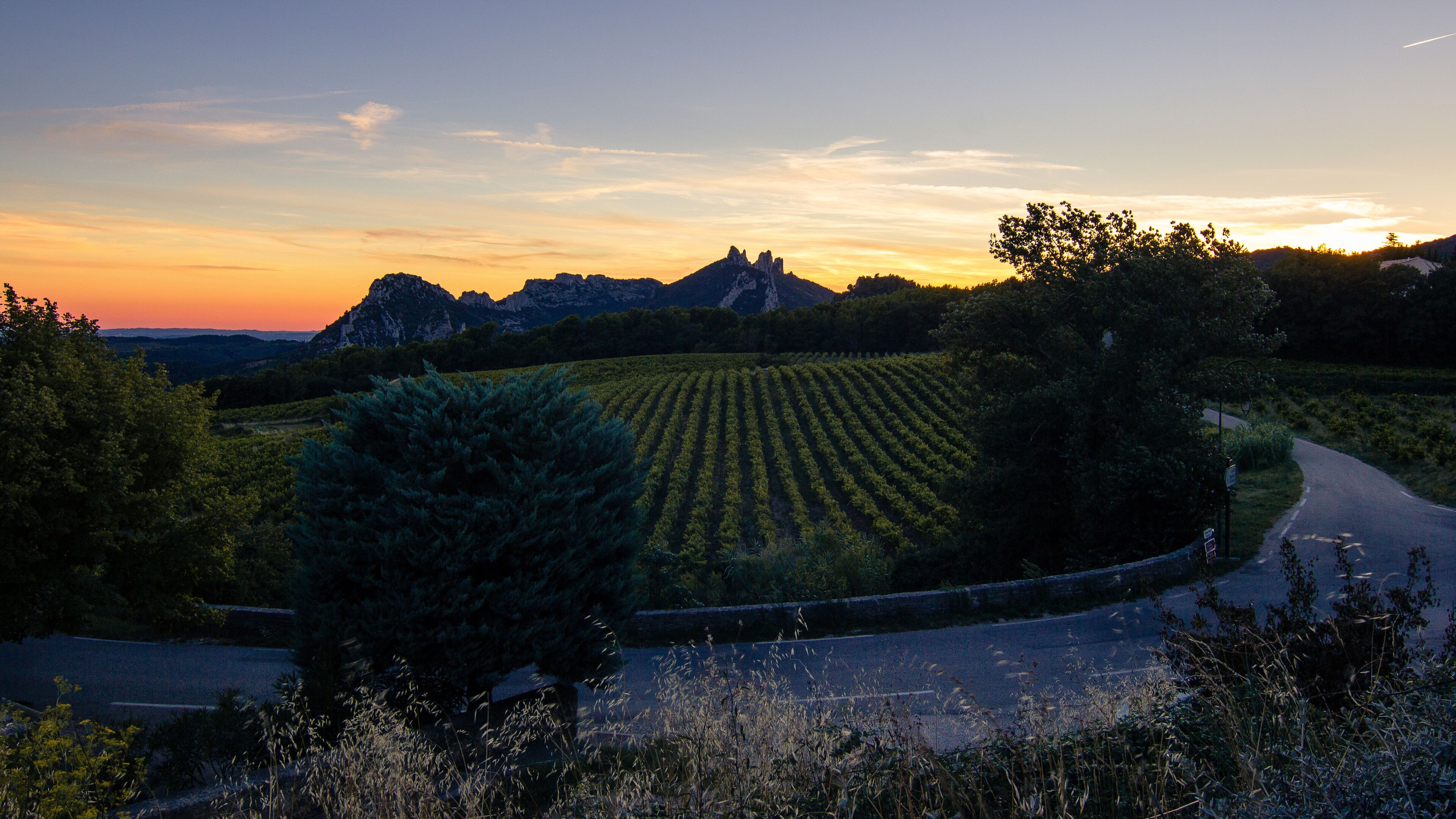The Dentelles de Montmirail seen from the distance during sunset in Vaucluse, Provence, France