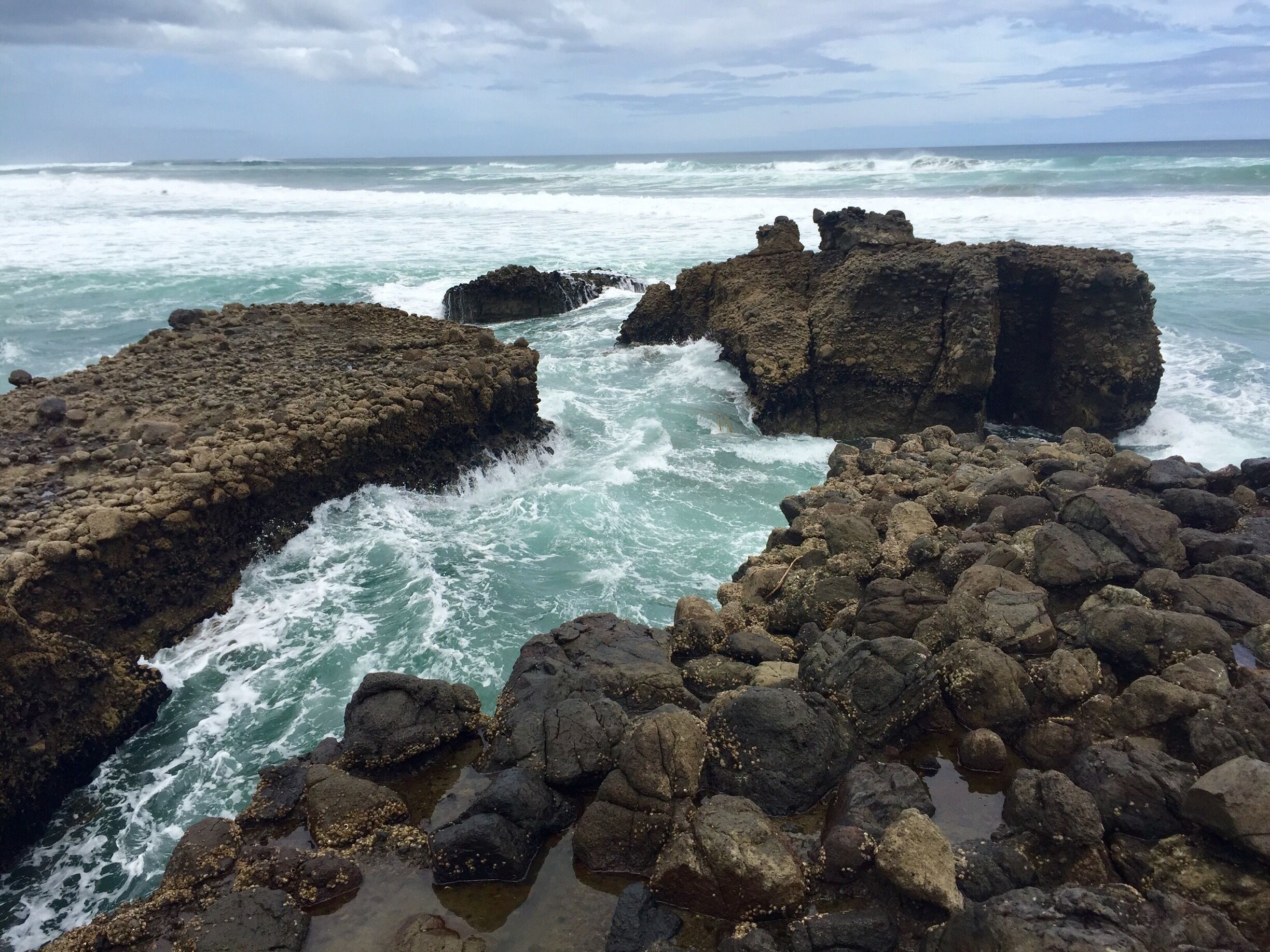 Another beautiful NZ beach! These are fun rocks to climb on in the corner of the beach and the waves make for some good splashed. Just be careful climbing around!! O and Don't miss the waterfall that's only a few min walk away from the parking lot)
