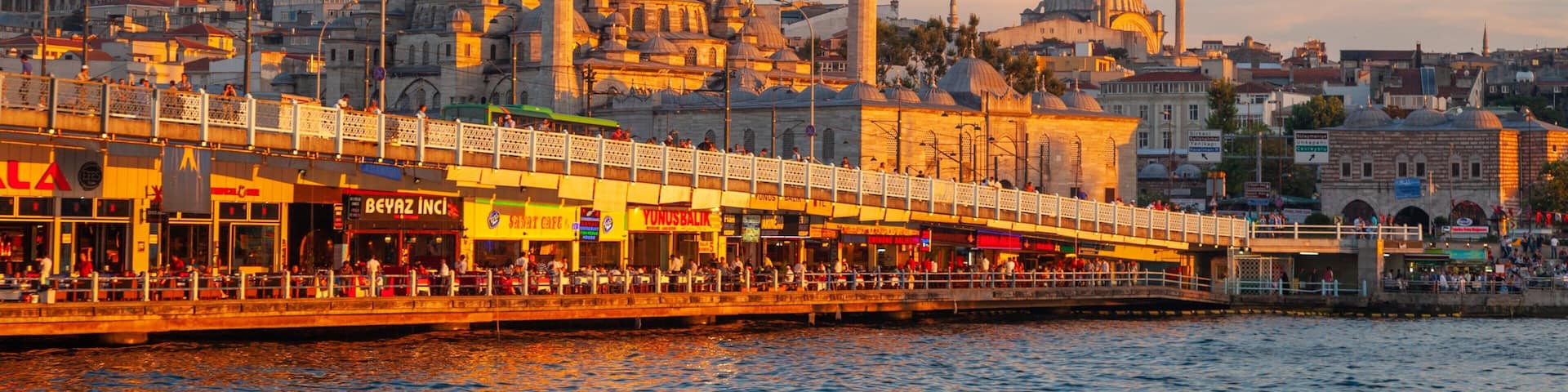 New Mosque showing a sunset, a city and a bay or harbor