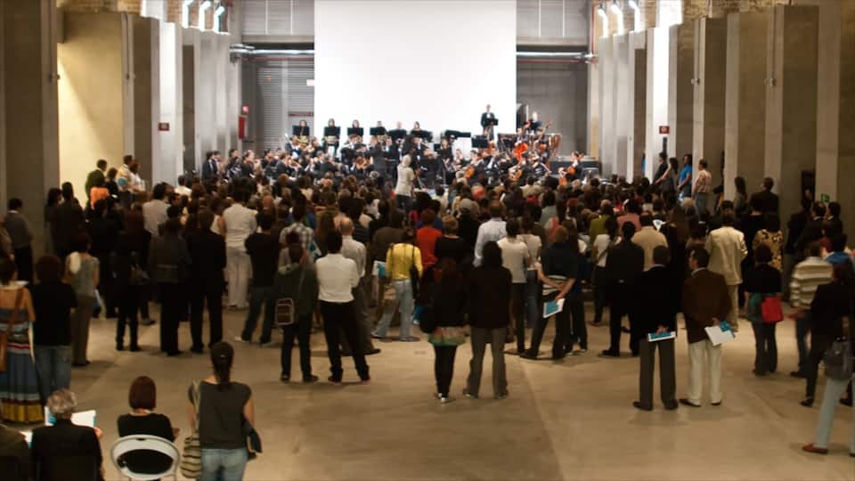 Medellin\'s Museum of Modern Art showing interior views as well as a large group of people